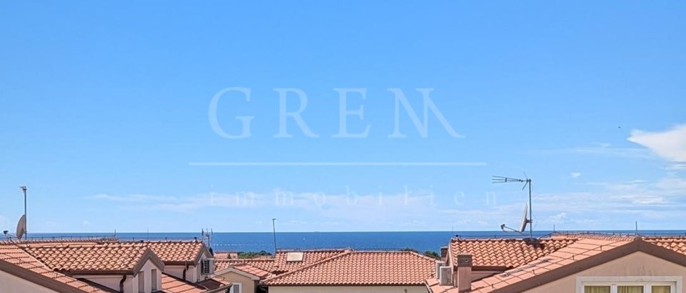 Apartment Poreč in a building with an elevator, sea view